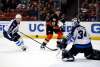 (AP Photo/Ryan Kang)
Winnipeg Jets goalie Michael Hutchinson, right, blocks a shot by Anaheim Ducks right wing Corey Perry, center, as defenceman Jacob Trouba, left, watches during the second period of an NHL hockey game, Friday, in Anaheim, Calif.