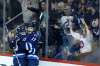 JOHN WOODS / WINNIPEG FREE PRESS
Winnipeg Jets' Mark Scheifele and Adam Lowry celebrate Lowry's game-winning goal Sunday against the Vancouver Canucks.
