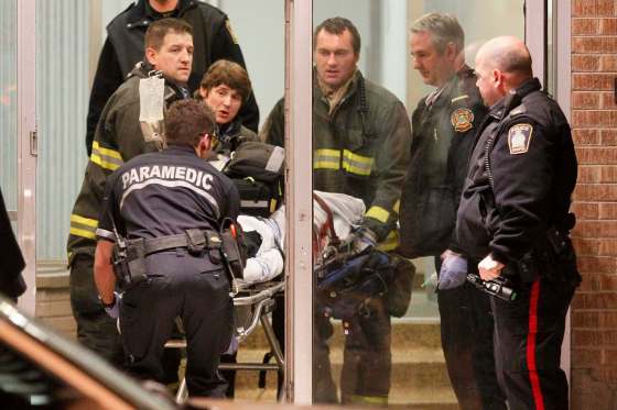 John Woods / Winnipeg Free Press filesThe body of Alche Fsehaye Kidane is removed from her home after police received a 911 call from her husband in which he confessed to killing her.