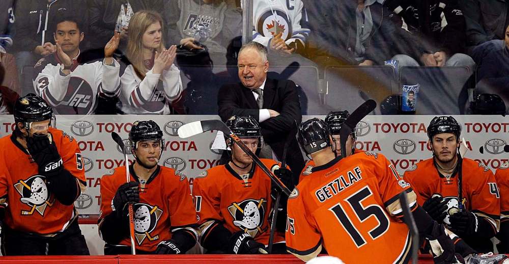 PHIL HOSSACK /WINNIPEG FREE PRESS - Anaheim Duck's coach Randy Carlyle behind the bench against his former team.