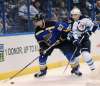 AP Photo/Bill Boyce
Winnipeg Jets' Joel Armia reaches around St. Louis Blues' Alex Pietrangelo during the first period Tuesday, in St. Louis.