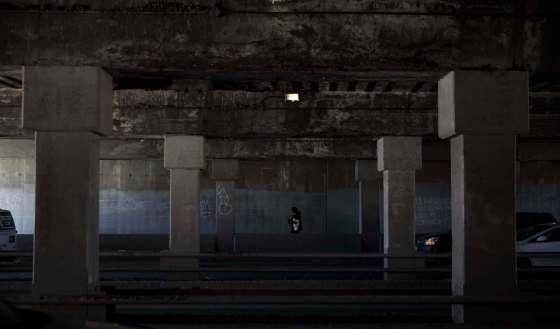 MIKE DEAL / WINNIPEG FREE PRESSManitoba Hydro recently replaced the light bulbs in the fixtures underneath the Higgins underpass in an attempt to increase the ambient light which had been very low and raised safety concerns for pedestrians.