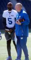 BORIS MINKEVICH / WINNIPEG FREE PRESS
Winnipeg Blue Bombers' Kenny Stafford and Offensive Coordinator & Receivers Coach Paul LaPolice chat at the teams mini camp