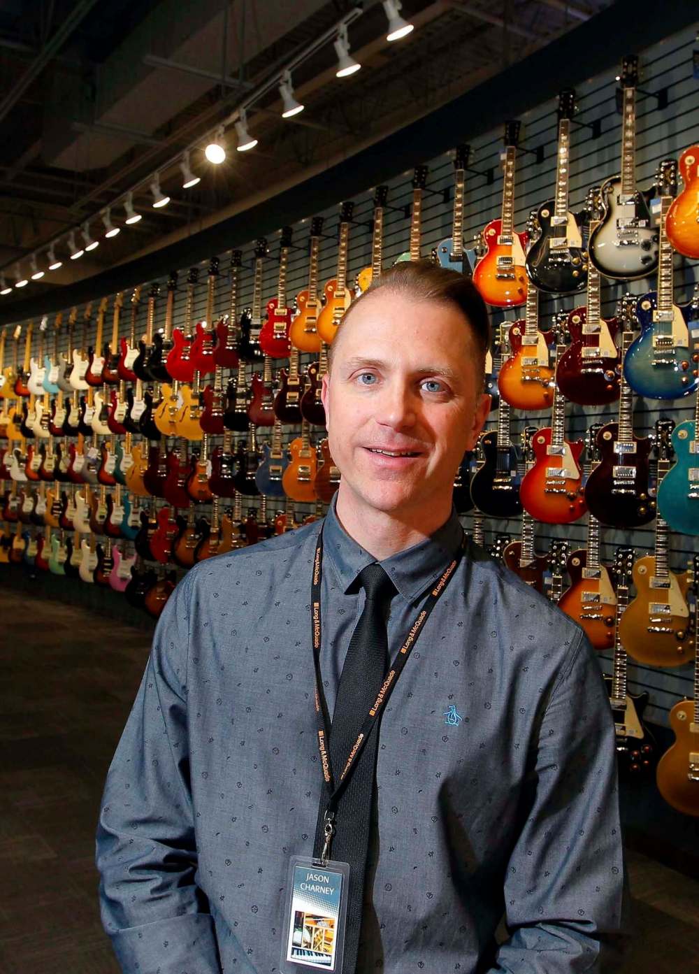 Jason Charney, manager of the new Long & McQuade store, says the company opted to renovate the former Office Depot on Pembina Highway instead of building a new store.