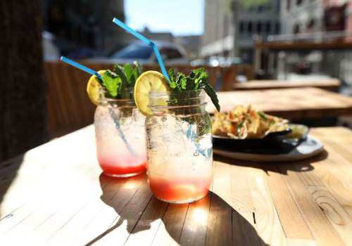 RUTH BONNEVILLE / WINNIPEG FREE PRESS
Forth&rsquo;s new patio features house-made shrubs: grape-lemon-lavender (left) and raspberry-ginger-cardamom.