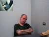 Mark Grant is interviewed by police in 2007.