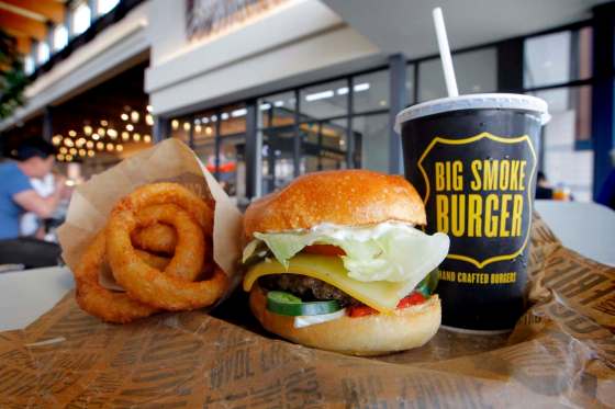 BORIS MINKEVICH / WINNIPEG FREE PRESSA Big Smoke cheese burger and onion rings.