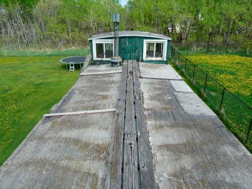 The caboose’s roof will need work to survive another winter — and/or my grandchildren.