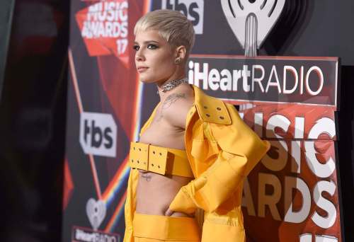 Singer Halsey regularly dons extreme crop tops, such as this yellow number she wore at the iHeartRadio Music Awards on March 5.(Jordan Strauss / Invision Files)