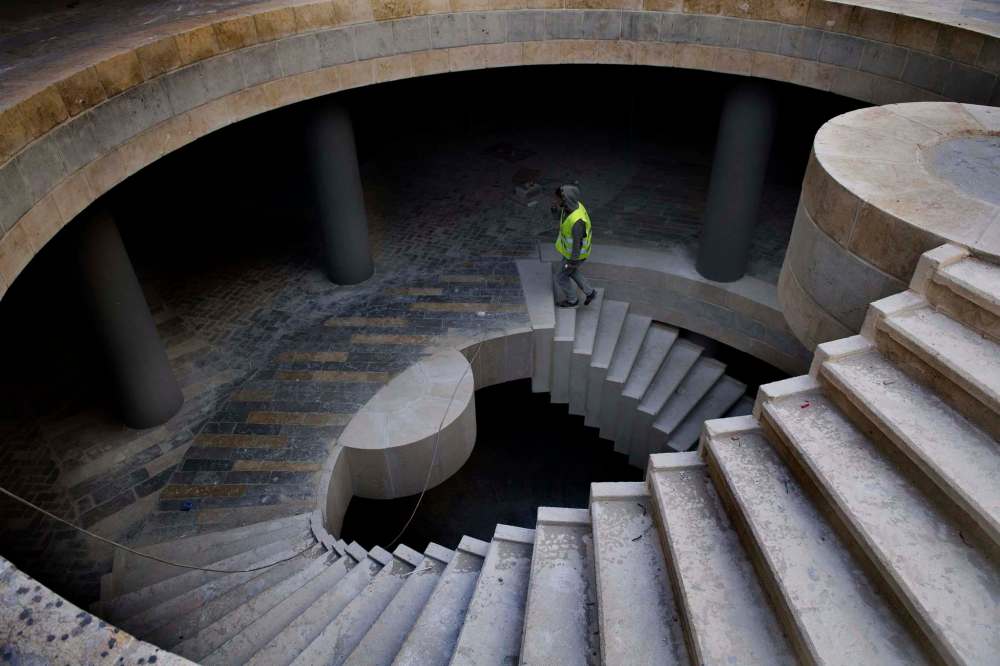 Linda Davidson / Washington Post
A construction worker ascends from an underground parking lot in Rawabi.
