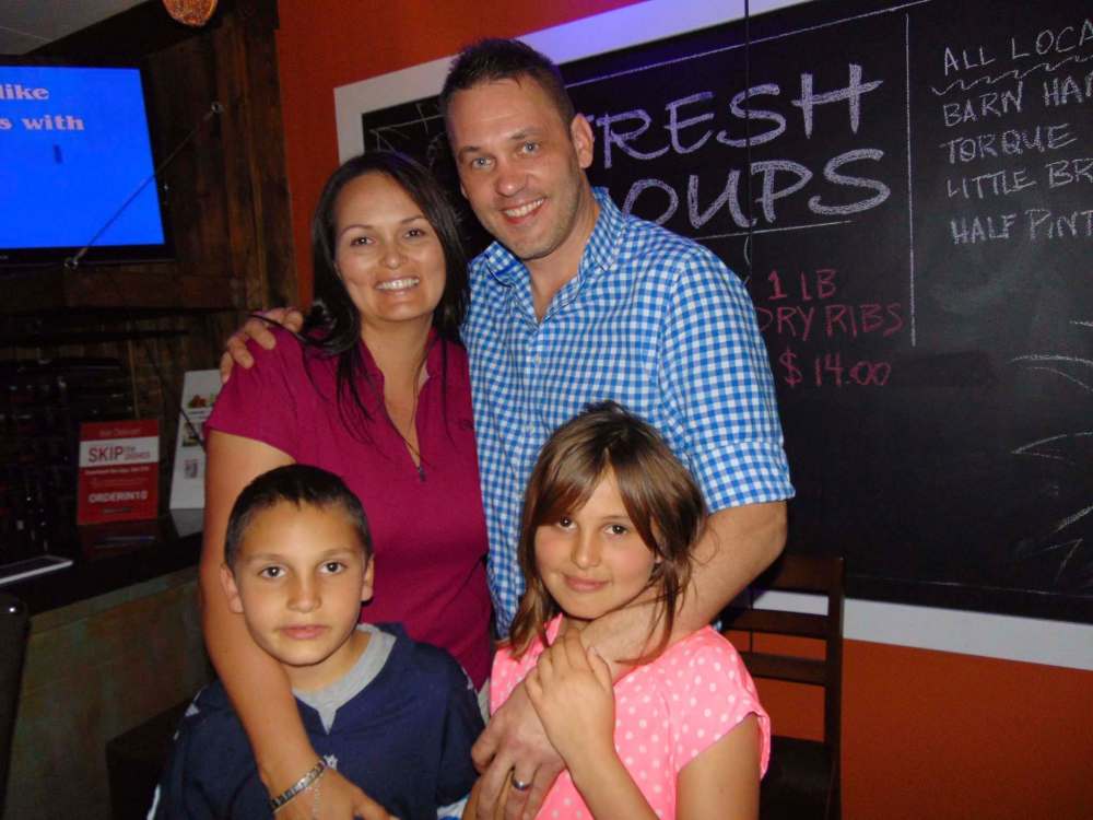 MAUREEN SCURFIELD/WINNIPEG FREE PRESS
Crystal Cyr and Tyler MacPherson with their children Hunter, 7, and Cassidy, 9.