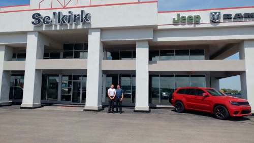 Myron Love / Winnipeg Free Press
Andy Rewucki, left, recently sold Selkirk Chrysler to Jeff Novakoski, right, and Lawrence Isfeld.