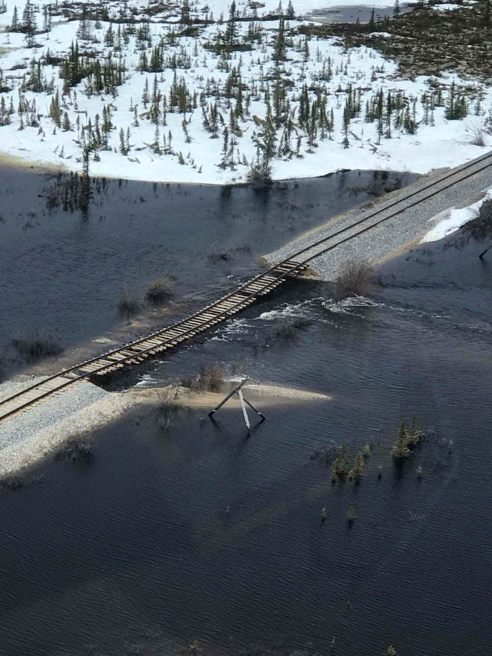 THE CANADIAN PRESS/HO-OmniTrax
The owners of the Hudson Bay Railway line say flooding that submerged a section of the track, shown in this handout image, and stopped service on May 23 has caused