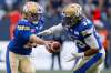 THE CANADIAN PRESS / John Woods
Winnipeg Blue Bombers quarterback Matt Nichols hands off to Andrew Harris during the first half against the Edmonton Eskimos, Thursday.