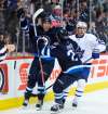 Winnipeg Jets' Patrik Laine (29) celebrates his overtime hat-trick goal against the Toronto Maple Leafs with Nikolaj Ehlers (27) at the MTS Centre last October. The Winnipeg Jets take on the Toronto Maples Leafs in their 2017/18 home opener on Oct. 4. (Mike Deal / Winnipeg Free Press files)