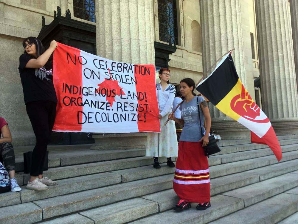 BORIS MINKEVICH / WINNIPEG FREE PRESS
Protestors took over the steps at the Manitoba Legislature Saturday afternoon.