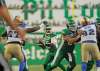 THE CANADIAN PRESS / Mark Taylor
Winnipeg Blue Bombers interior defensive linemen Drake Nevis and Cory Johnson make life difficult for Saskatchewan Roughriders quarterback Kevin Glenn in Regina on Saturday.