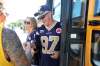 RUTH BONNEVILLE / WINNIPEG FREE PRESS
Winnipeg Blue Bomber fans are all smiles as they get off the shuttle bus at new bus terminal at Investors Group Stadium for the first game Friday evening.
