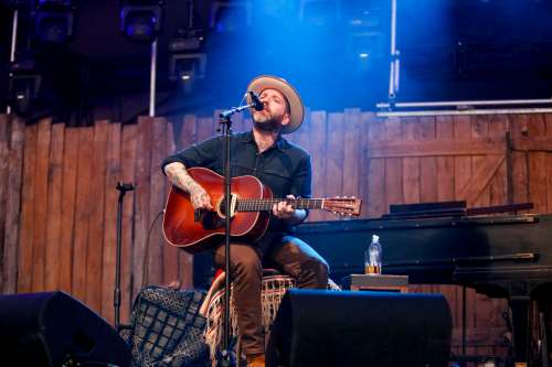 JUSTIN SAMANSKI-LANGILLE / WINNIPEG FREE PRESS
Dallas Green of City and Colour performs a stripped-down solo show for crowds Friday evening on the Main Stage at Folk Fest.