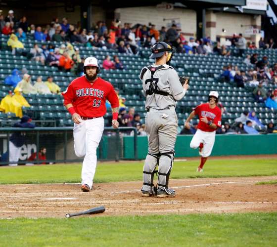 JUSTIN SAMANSKI-LANGILLE / WINNIPEG FREE PRESSGoldeyes first baseman David Bergin runs towards home base with teammate Wes Darvill close behind him during Tuesday's game against the Sioux City Explorers.