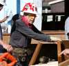 Former U.S. president Jimmy Carter helps build steps for a home on Lyle Street. (Wayne Glowacki / Winnipeg Free Press)