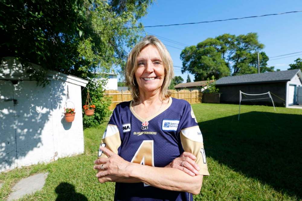 JUSTIN SAMANSKI-LANGILLE / WINNIPEG FREE PRESS
Karen Kuldys outside her home Friday. Kuldys was set to win $1 million during last night's Blue Bombers game when a controversial penalty call in the second quarter cost her the prize.