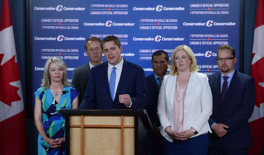 Sean Kilpatrick / The Canadian Press
Tory Leader Andrew Scheer praises Manitoba MP Candice Bergen (left) for her ‘incredible skill’ Thursday while naming her permanent party House leader.