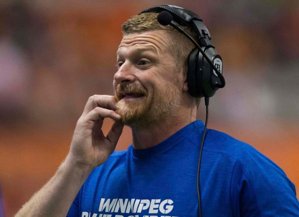 Winnipeg Blue Bombers' head coach Mike O'Shea scratches his chin on the sideline during the second half of a CFL football game against the B.C. Lions in Vancouver, B.C., on Friday July 21, 2017.