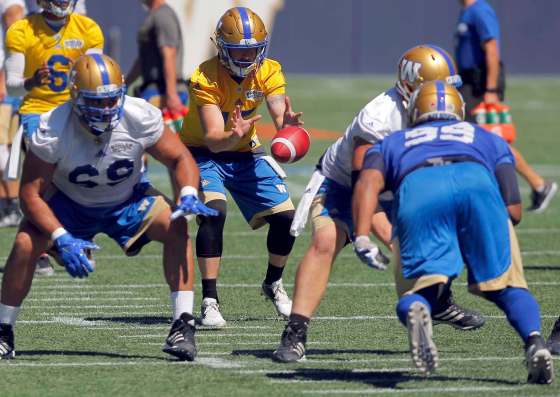 BORIS MINKEVICH / WINNIPEG FREE PRESSBombers quarterback Matt Nichols takes a snap in practice at Investors Group Field on Tuesday.