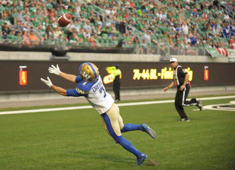 Winnipeg Blue Bombers wide receiver Weston Dressler stretches out for a pass during CFL action against the Saskatchewan Roughriders at the brand new Mosaic Stadium, in Regina on Saturday, July 1, 2017. THE CANADIAN PRESS/Mark Taylor