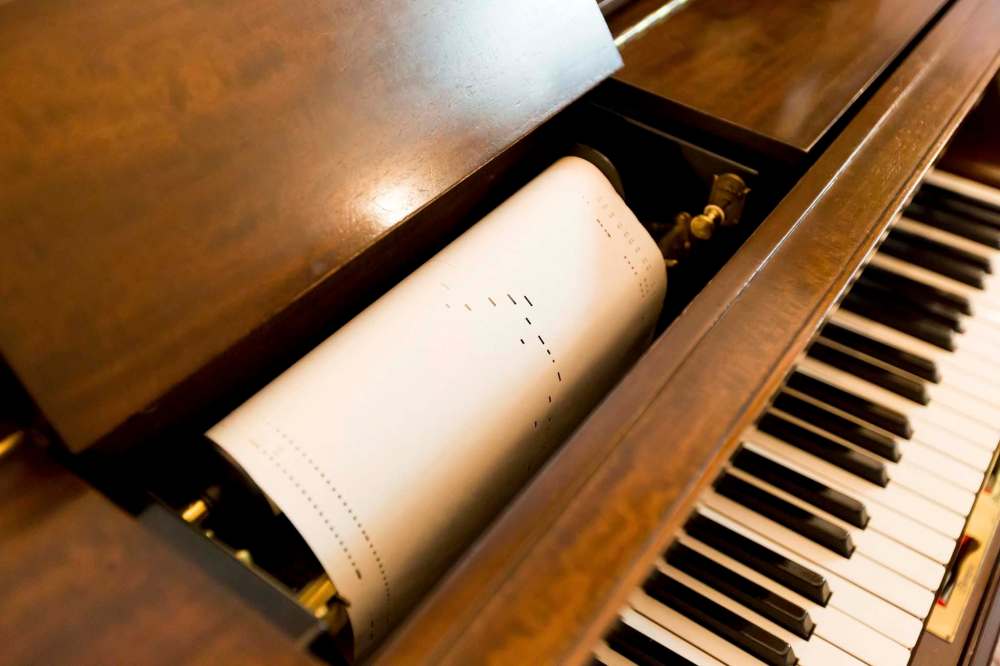 JUSTIN SAMANSKI-LANGILLE / WINNIPEG FREE PRESSA music scroll sits ready to play in a grand player piano sits in Alan Turner’s house. Turner has over 15 automatic instruments in his personal collection and hundreds of music scrolls. He is the president of the Automatic Musical Instruments Collectors Association.170727 - Thursday, July 27, 2017.