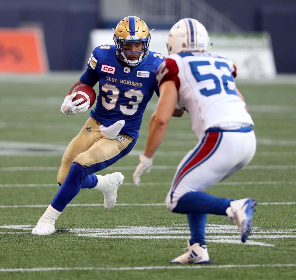 Trevor Hagan / The Canadian Press files
Andrew Harris (left) has been a threat in the air and on the ground for the Blue Bombers over the last three weeks.