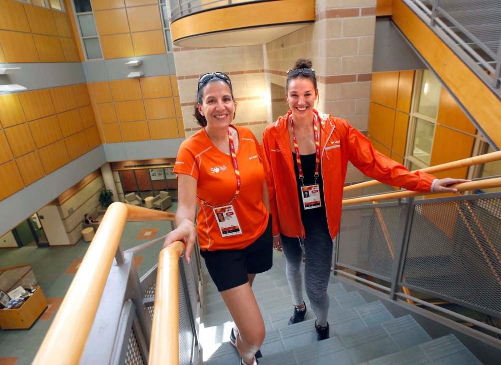 WAYNE GLOWACKI / WINNIPEG FREE PRESS
At left, Dr. Adrienne Leslie-Toogood (the Canadian Sport Centre Manitoba's lead psychologist) and Olympic swimmer and Manitoban Chantal Van Landeghem in the Helen Glass Centre for Nursing on the U of M campus that is part of the Canada Summer Games Athletes Village.