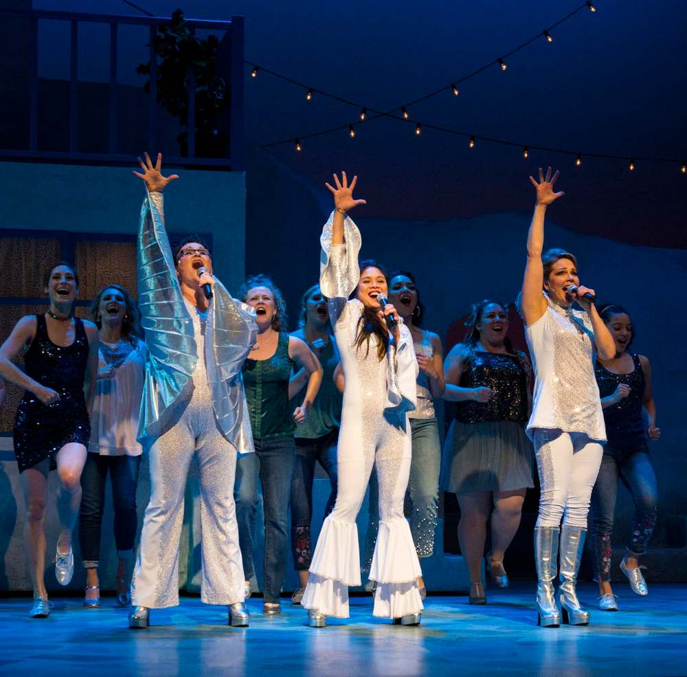 Robert Tinker photo
Dancing Queens: Denise Oucharek (left), Ma-Anne Dionisio and Jennifer Lyon in Mamma Mia!