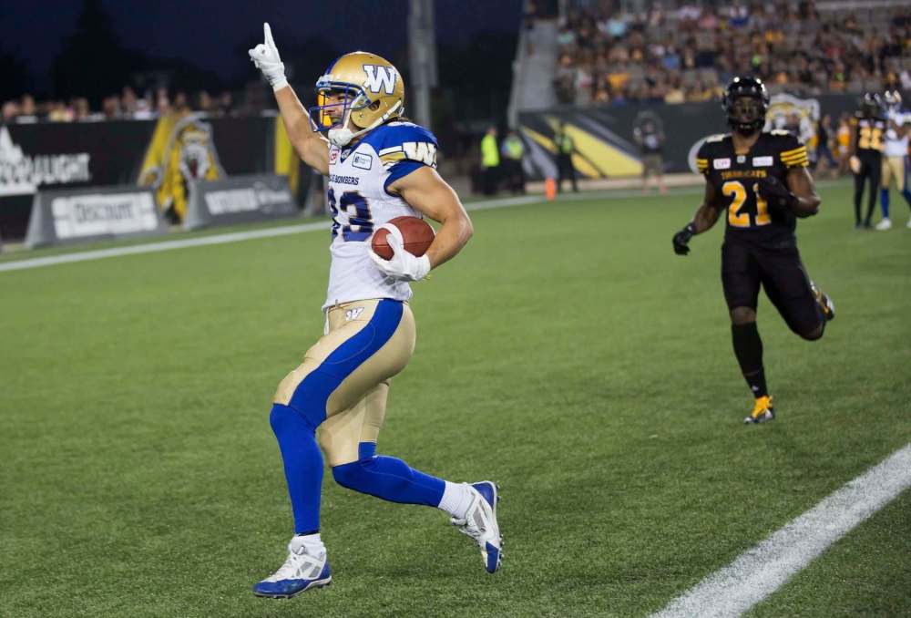 Aaron Lynett / The Canadian Press Files
Bombers receiver Julian Feoli-Gudino scores a touchdown against Hamilton on Saturday.