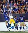 PHIL HOSSACK / WINNIPEG FREE PRESS files
The Winnipeg Blue Bombers’ Roc Carmichael goes up for the ball against Edmonton Eskimos’ D’haquille Williams on Thursday.