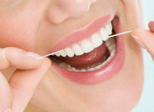 GETTY CREATIVE PHOTO
The secret to clean teeth? Not having massive, meaty man hands like mine so you can properly articulate the thin dental floss.