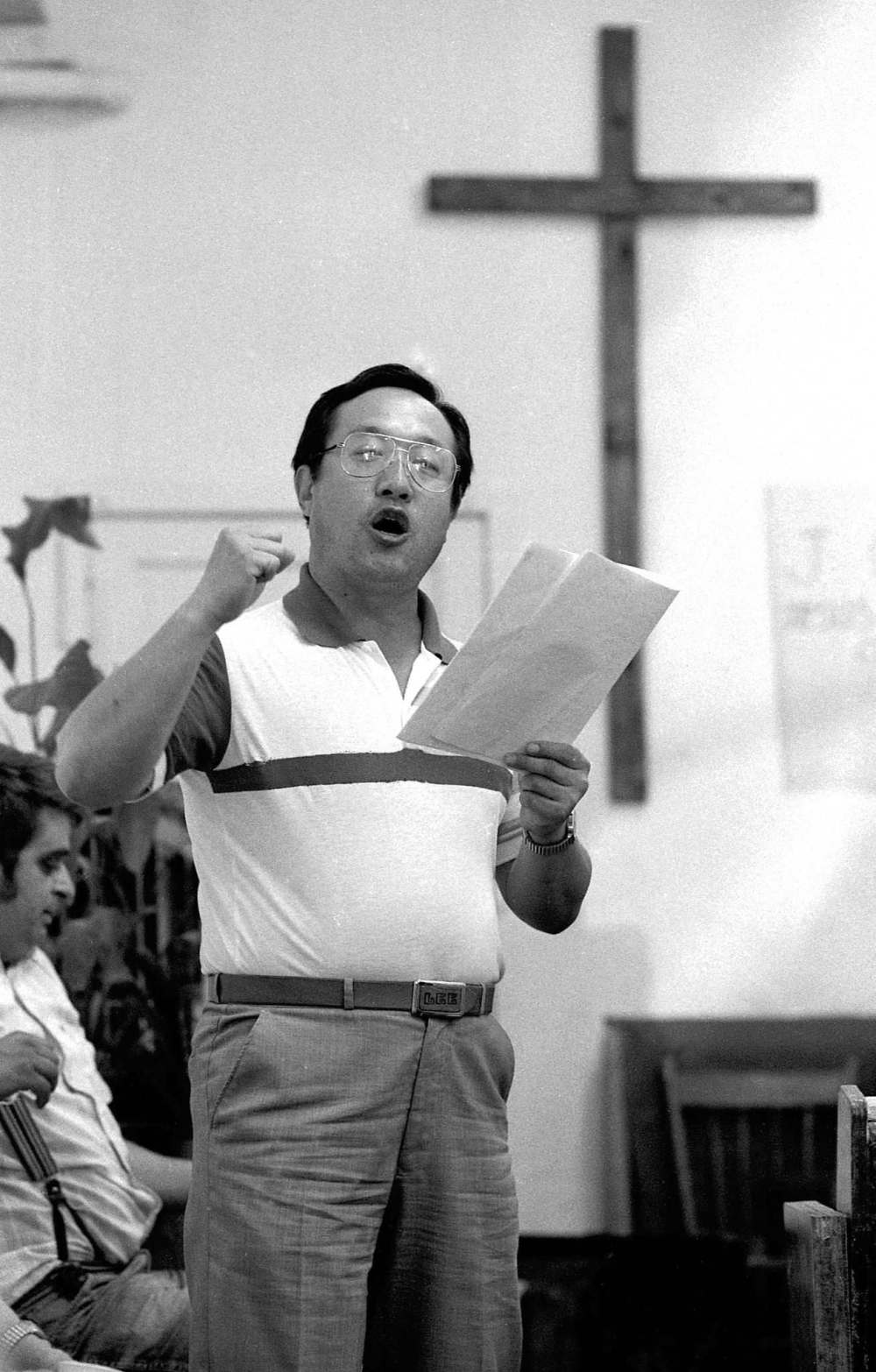 PHIL HOSSACK / WINNIPEG FREE PRESS FILES
June 25, 1988 Suk Woon Lee exhorts worshippers to put their trust in God at his Main Street mission.