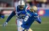 THE CANADIAN PRESS/Paul Chiasson
Winnipeg Blue Bombers defensive back Chris Randle intercepts a pass during the first quarter Thursday in Montreal.