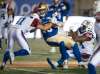 THE CANADIAN PRESS/Paul Chiasson
Winnipeg Blue Bombers quarterback Matt Nichols is tackled by Montreal Alouettes linebackers in the third quarter, Thursday. The Bombers double overtime win on Thursday might have been an ugly one, but the victory is all that matters to Nichols and the rest of the squad.