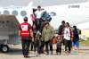 Tim Smith/The Brandon Sun
Evacuees from the Island Lake area of north-eastern Manitoba arrive at the Brandon Municipal Airport on Wednesday after forest fires forced them from their communities.
