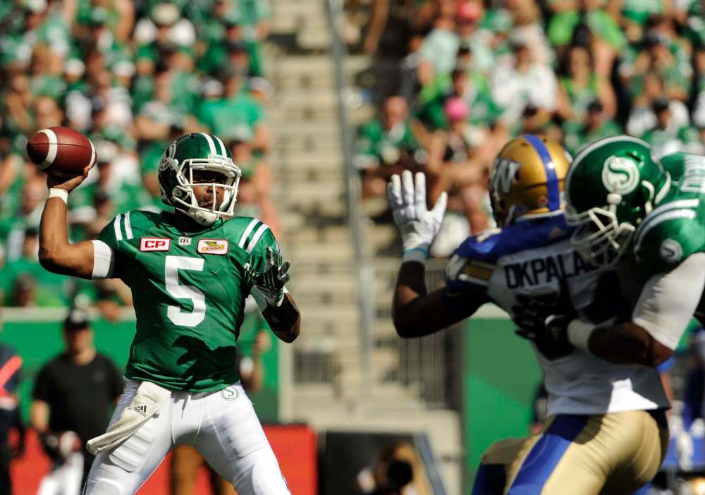 MARK TAYLOR / THE CANDIAN PRESS
Saskatchewan Roughriders quarterback Kevin Glenn looks for a receiver during first half CFL action against the Winnipeg Blue Bombers.