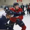 WAYNE GLOWACKI / WINNIPEG FREE PRESS
Tucker Poolman (right) ties up Kody McDonald at the Jets camp Thursday.