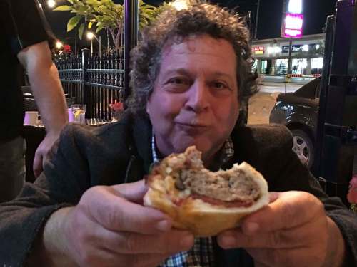 SUPPLIED
Mona Lisa restaurant owner Joe Grande, with his restaurant&rsquo;s Burger Week entry.