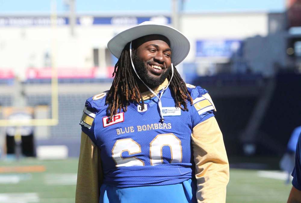 RUTH BONNEVILLE / WINNIPEG FREE PRESS
Offensive lineman Travis Bond shows off his chapeau during a walk-through practice Friday at Investors Group Field.