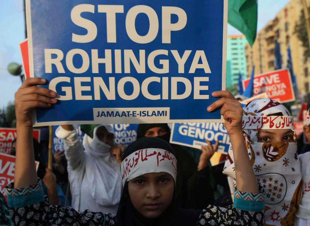 Fareed Khan / The Associated Press Files
Supporters of Jamaat-e-Islami, a Pakistani religious group, rally in Karachi Sunday to condemn violence against the Rohingya Muslim minority in Myanmar.