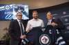 DAVID LIPNOWSKI / CANADIAN PRESS FILES
Contract extensions for Paul Maurice (left) and Kevin Cheveldayoff (right) sends a message to fans the 2017-18 Jets 'can be' a playoff team, while Captain Blake Wheeler got it right — the Jets 'must be' a playoff team.