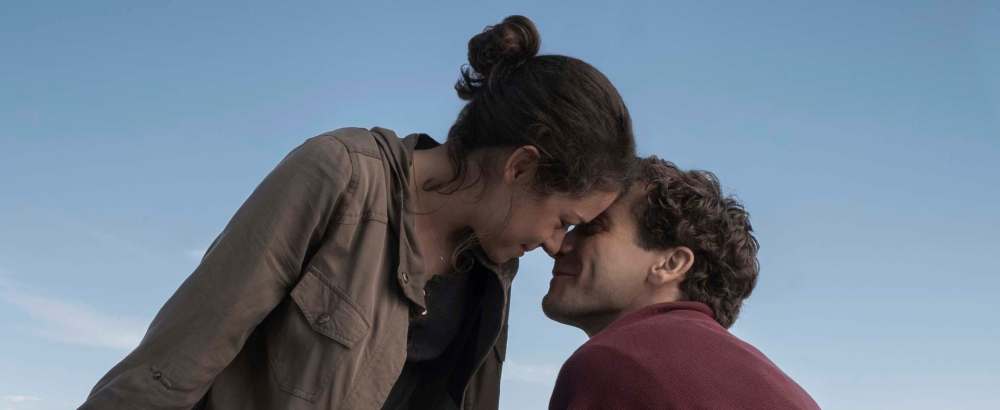 Scott Garfield / Lionsgate
Boston Marathon bombing victim Jeff Bauman (portrayed by Jake Gyllenhaal) kisses his then-girlfriend Erin Hurley (Tatiana Maslany).
