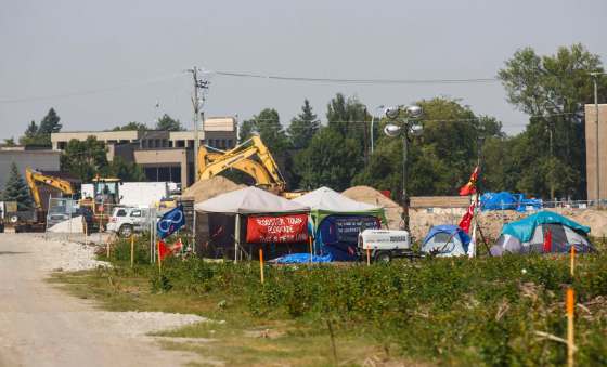 MIKE DEAL / WINNIPEG FREE PRESS FILESConstruction continues around protesters who have been camped out on the Parker lands development site since July 14.