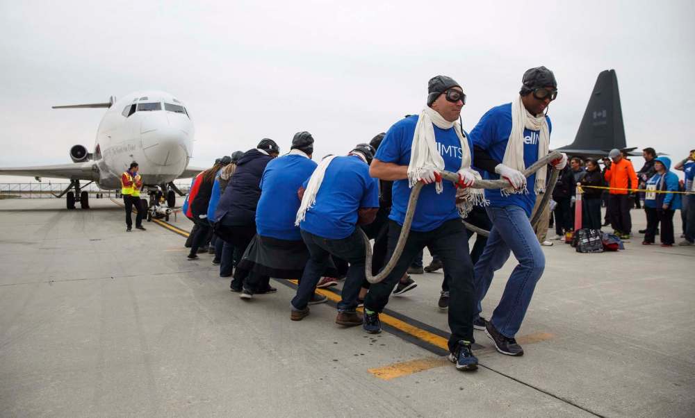 MIKE DEAL / WINNIPEG FREE PRESS
A record number of teams participated in the United Way’s 14th annual plane-pulling event Friday.